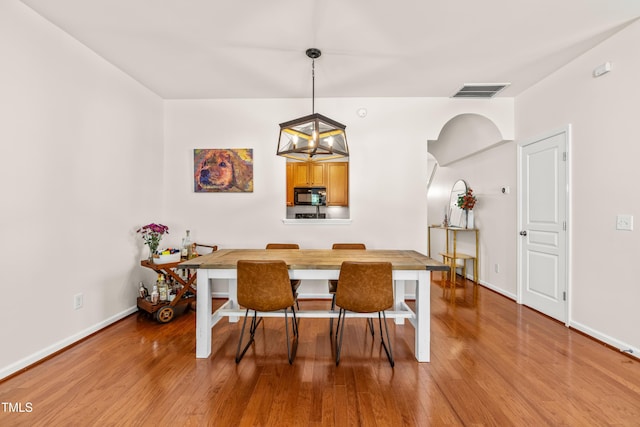 2635 Asher View Ct, Raleigh, NC 27606 - dining area with wood finished floors and baseboards