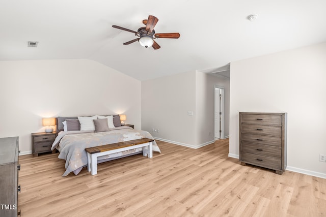 2635 Asher View Ct, Raleigh, NC 27606 - bedroom with light wood-style flooring, vaulted ceiling, attic access, baseboards, and ceiling fan