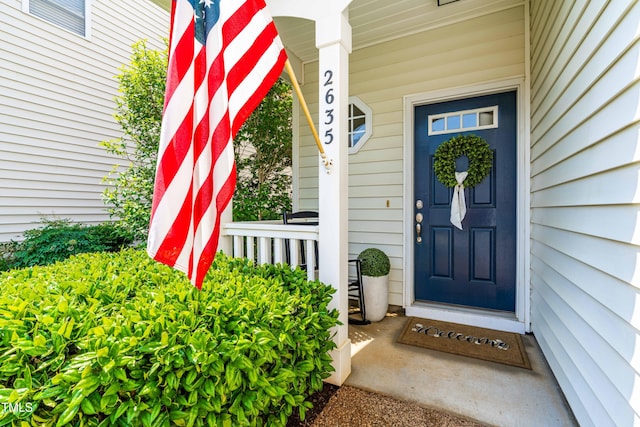2635 Asher View Ct, Raleigh, NC 27606 - doorway to property featuring covered porch