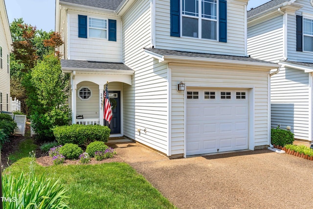 2635 Asher View Ct, Raleigh, NC 27606 - view of front of house featuring an attached garage, roof with shingles, and driveway