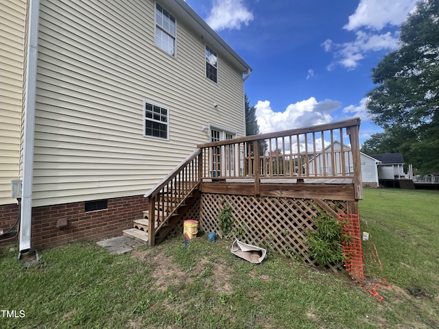 2377 Vinson Rd, Clayton, NC 27527 - back of house featuring a wooden deck, a yard, crawl space, and stairway