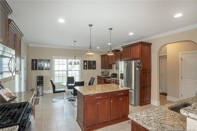 4222 Dock View Rd, Fayetteville, NC 28306 - kitchen featuring stainless steel appliances, arched walkways, a kitchen island, light tile patterned flooring, and hanging light fixtures