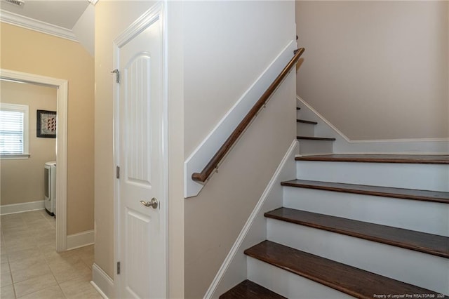 4222 Dock View Rd, Fayetteville, NC 28306 - stairs featuring washer / clothes dryer, tile patterned floors, and crown molding