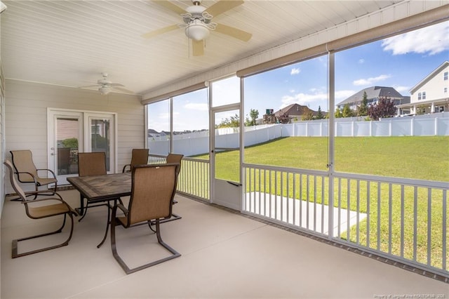 4222 Dock View Rd, Fayetteville, NC 28306 - sunroom featuring a ceiling fan, outdoor dining space, and a residential view