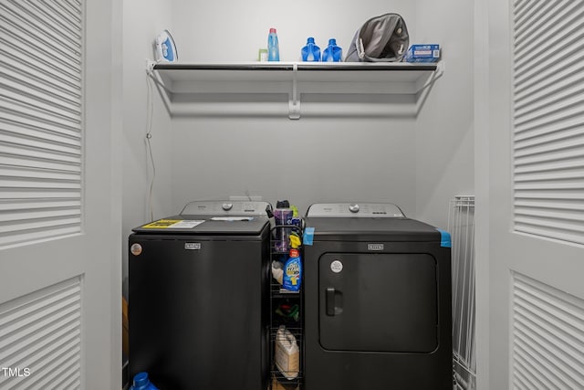 clothes washing area with independent washer and dryer