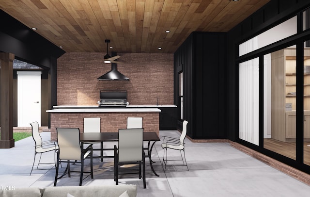 300 Westerman Pl, Smithfield, NC 27577 - kitchen featuring wooden ceiling, finished concrete flooring, light countertops, a center island, and brick wall