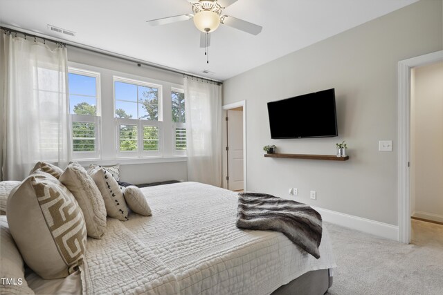 1602 Bowery Dr, Raleigh, NC 27607 - bedroom featuring carpet floors, baseboards, and ceiling fan