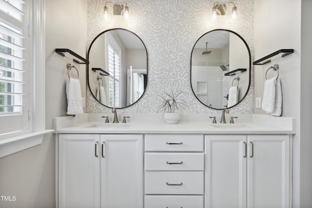 1602 Bowery Dr, Raleigh, NC 27607 - full bath with wallpapered walls, tiled shower, and double vanity