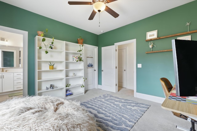 1602 Bowery Dr, Raleigh, NC 27607 - bedroom featuring light carpet, ensuite bathroom, baseboards, and ceiling fan