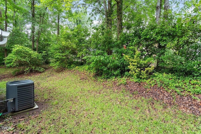 view of yard featuring central AC