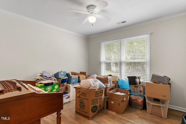 storage area with a ceiling fan