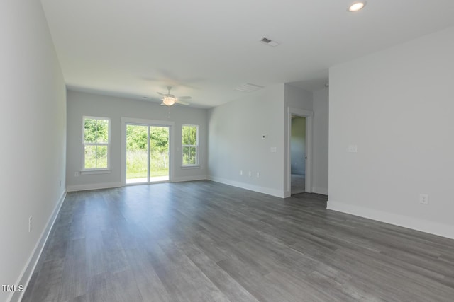 1739 Old Fields Blvd, Haw River, NC 27258 - unfurnished living room featuring ceiling fan, baseboards, dark wood-type flooring, and recessed lighting