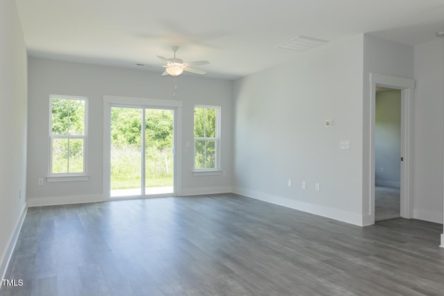 1739 Old Fields Blvd, Haw River, NC 27258 - unfurnished living room with a ceiling fan, baseboards, and wood finished floors
