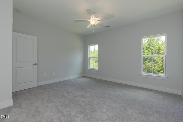 1739 Old Fields Blvd, Haw River, NC 27258 - carpeted empty room featuring a ceiling fan, baseboards, and a smoke detector