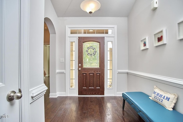 2916 Reynolda Cir, Durham, NC 27712 - entryway with wood-type flooring, arched walkways, and baseboards