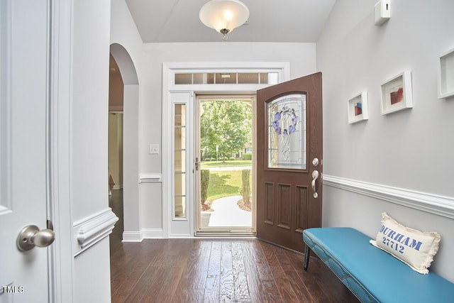 2916 Reynolda Cir, Durham, NC 27712 - entryway with arched walkways, wood finished floors, and baseboards