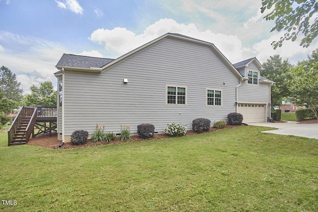 2916 Reynolda Cir, Durham, NC 27712 - view of property exterior with stairway, driveway, a garage, and a lawn