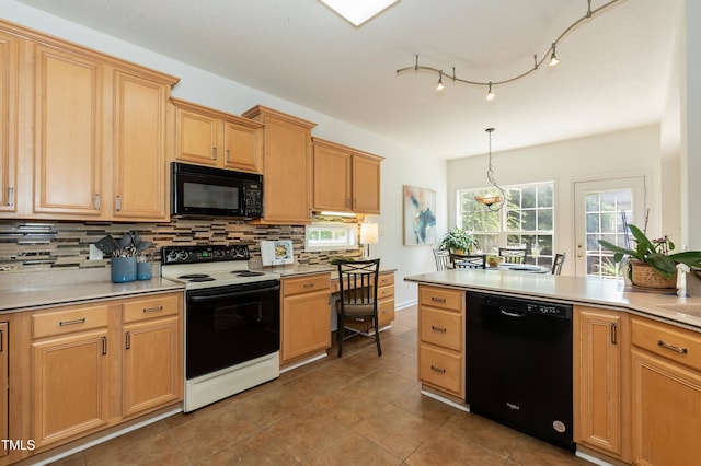 5501 Southern Cross Ave, Raleigh, NC 27606 - kitchen featuring black appliances, decorative backsplash, light countertops, and pendant lighting