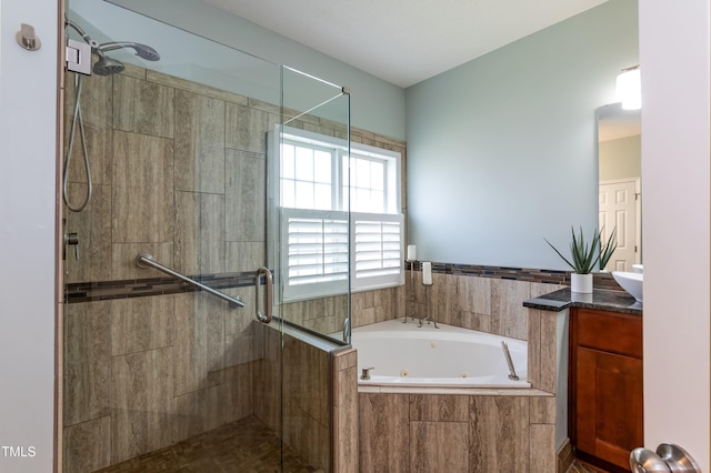 5501 Southern Cross Ave, Raleigh, NC 27606 - full bathroom featuring a stall shower, vanity, and a jetted tub