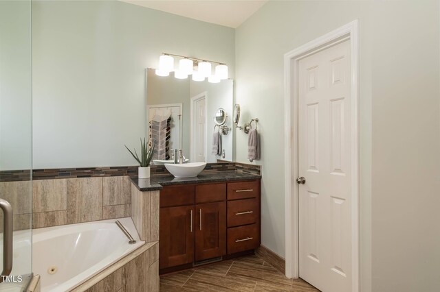 5501 Southern Cross Ave, Raleigh, NC 27606 - full bathroom with a jetted tub and vanity