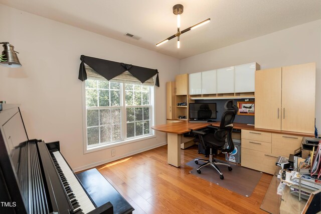 5501 Southern Cross Ave, Raleigh, NC 27606 - home office with light wood-type flooring