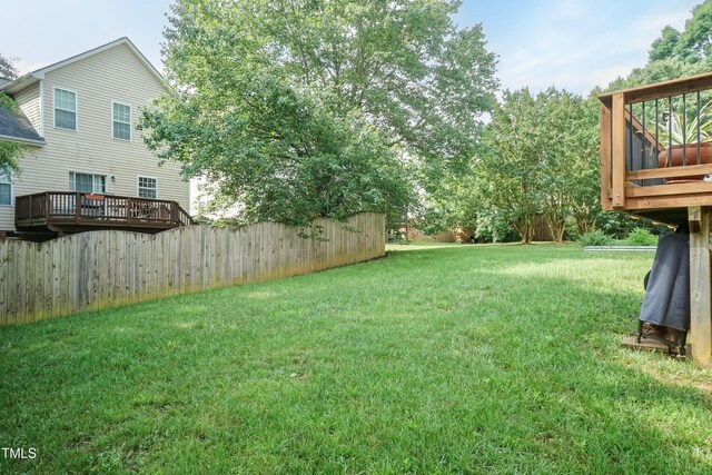 5501 Southern Cross Ave, Raleigh, NC 27606 - view of yard with a wooden deck