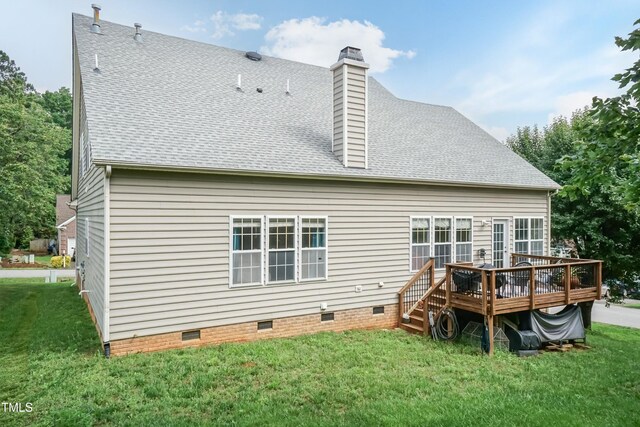 5501 Southern Cross Ave, Raleigh, NC 27606 - rear view of house featuring crawl space, a deck, a shingled roof, and a lawn