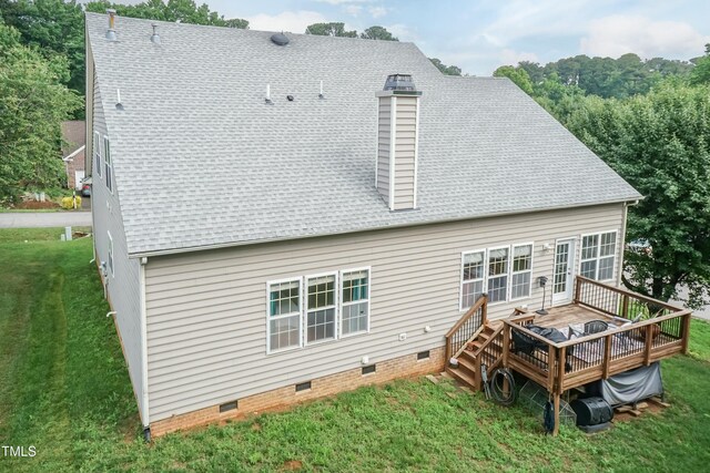 5501 Southern Cross Ave, Raleigh, NC 27606 - rear view of property with crawl space, a shingled roof, a wooden deck, a yard, and a chimney