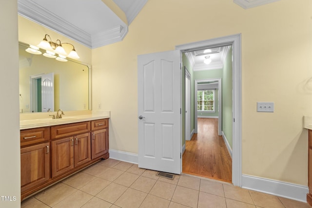 1010 Mill Pointe Way, Elon, NC 27244 - bathroom featuring ornamental molding, tile patterned flooring, vanity, and baseboards
