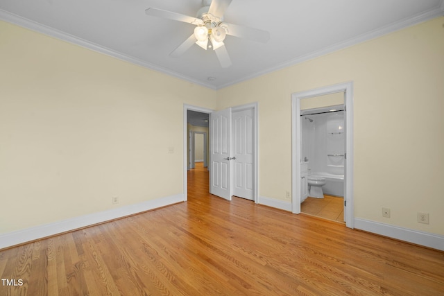 1010 Mill Pointe Way, Elon, NC 27244 - unfurnished bedroom with ornamental molding, baseboards, light wood finished floors, and ensuite bathroom