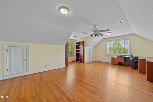 1010 Mill Pointe Way, Elon, NC 27244 - bonus room featuring light wood-style floors, lofted ceiling, built in features, an office area, and a ceiling fan