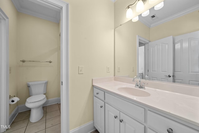 1010 Mill Pointe Way, Elon, NC 27244 - bathroom featuring ornamental molding, tile patterned flooring, baseboards, vanity, and toilet