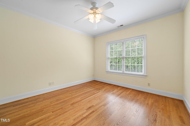 1010 Mill Pointe Way, Elon, NC 27244 - unfurnished room with baseboards, light wood finished floors, ornamental molding, and a ceiling fan