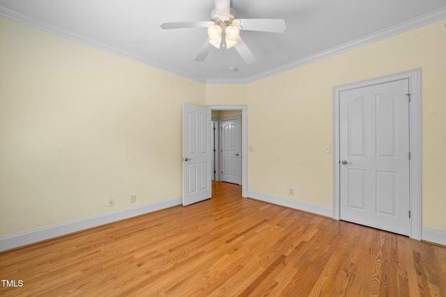 1010 Mill Pointe Way, Elon, NC 27244 - unfurnished bedroom featuring ornamental molding, baseboards, light wood finished floors, and ceiling fan