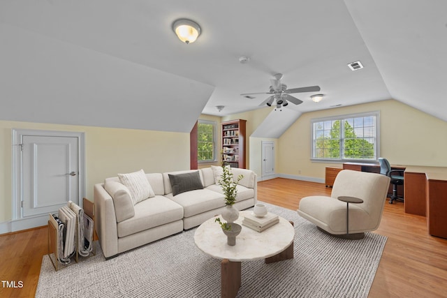 1010 Mill Pointe Way, Elon, NC 27244 - living room featuring light wood finished floors, lofted ceiling, and a ceiling fan