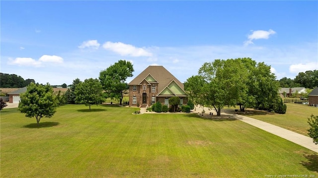 view of front of house with a front lawn