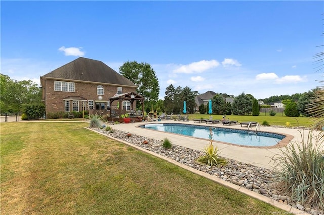 swimming pool featuring a gazebo, a yard, and a patio area