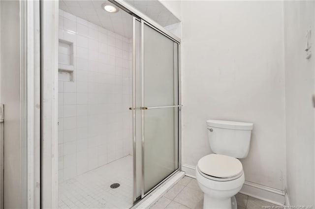 3229 Mcqueen Rd, Red Springs, NC 28377 - full bathroom with a shower stall, toilet, tile patterned floors, and baseboards