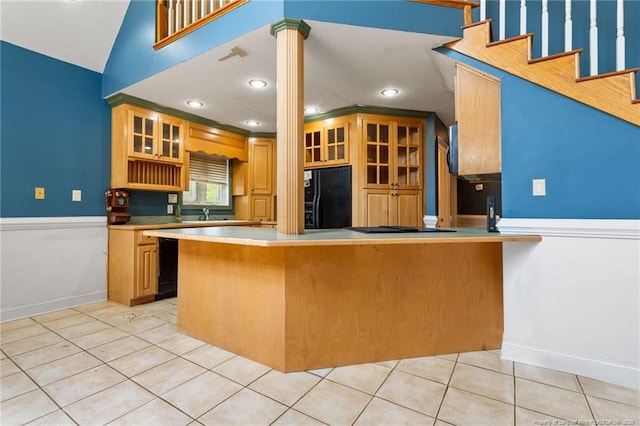 3229 Mcqueen Rd, Red Springs, NC 28377 - kitchen with black appliances, glass insert cabinets, light tile patterned floors, a peninsula, and recessed lighting