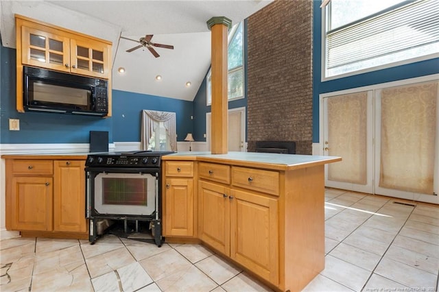 3229 Mcqueen Rd, Red Springs, NC 28377 - kitchen with black microwave, range with electric stovetop, high vaulted ceiling, ceiling fan, and healthy amount of natural light