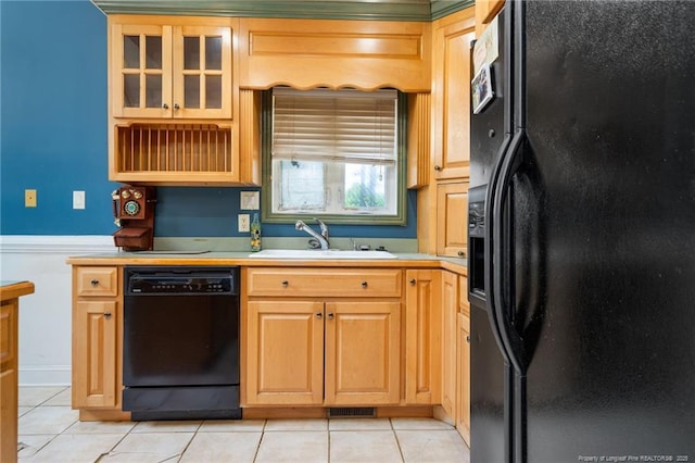 3229 Mcqueen Rd, Red Springs, NC 28377 - kitchen featuring black appliances, a sink, light countertops, light tile patterned floors, and glass insert cabinets