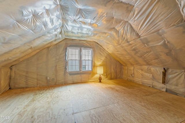 bonus room with vaulted ceiling