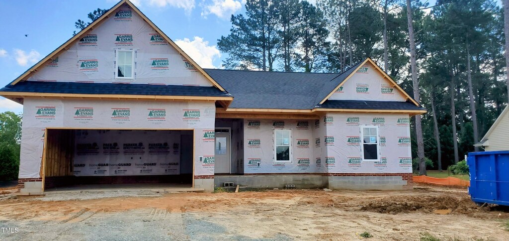 219 Crescent Dr, Dunn, NC 28334 - property in mid-construction with a shingled roof