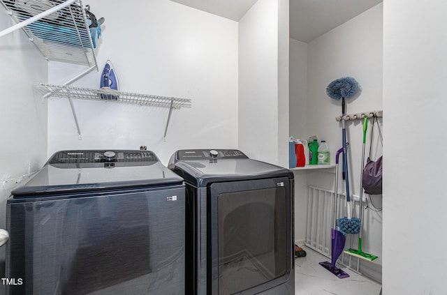 412 Collington Dr, Mebane, NC 27302 - laundry room featuring washing machine and clothes dryer and light marble finish floors
