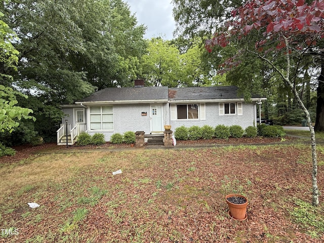 200 Walnut St, Cary, NC 27511 - ranch-style home with a chimney