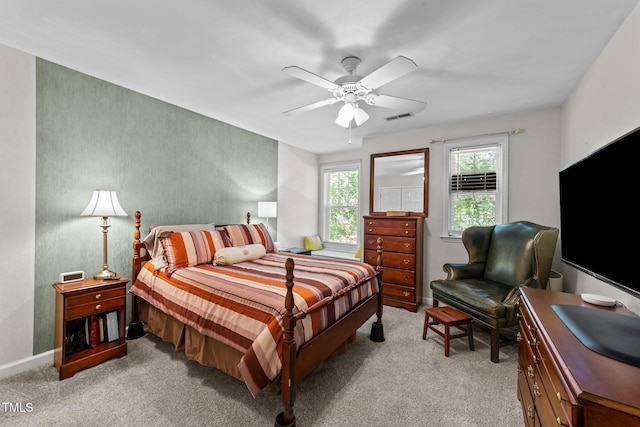 11013 Louson Pl, Raleigh, NC 27614 - bedroom with light carpet, a ceiling fan, and baseboards