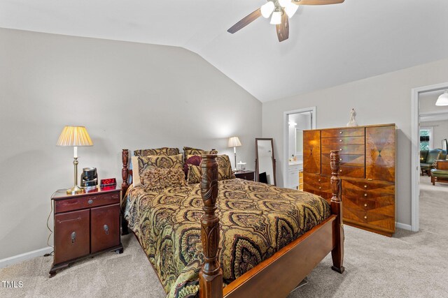 11013 Louson Pl, Raleigh, NC 27614 - bedroom with light carpet, vaulted ceiling, ceiling fan, ensuite bath, and baseboards