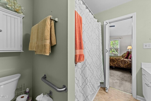 11013 Louson Pl, Raleigh, NC 27614 - ensuite bathroom with toilet and vanity