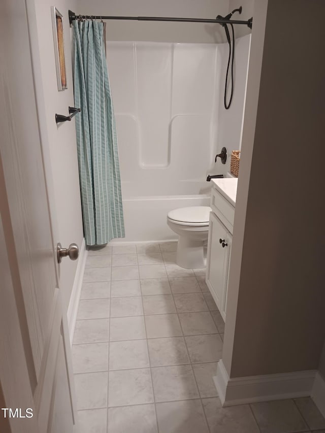 31 Kevior Ave, Four Oaks, NC 27524 - bathroom with tile patterned floors, vanity, toilet, shower / tub combo, and baseboards