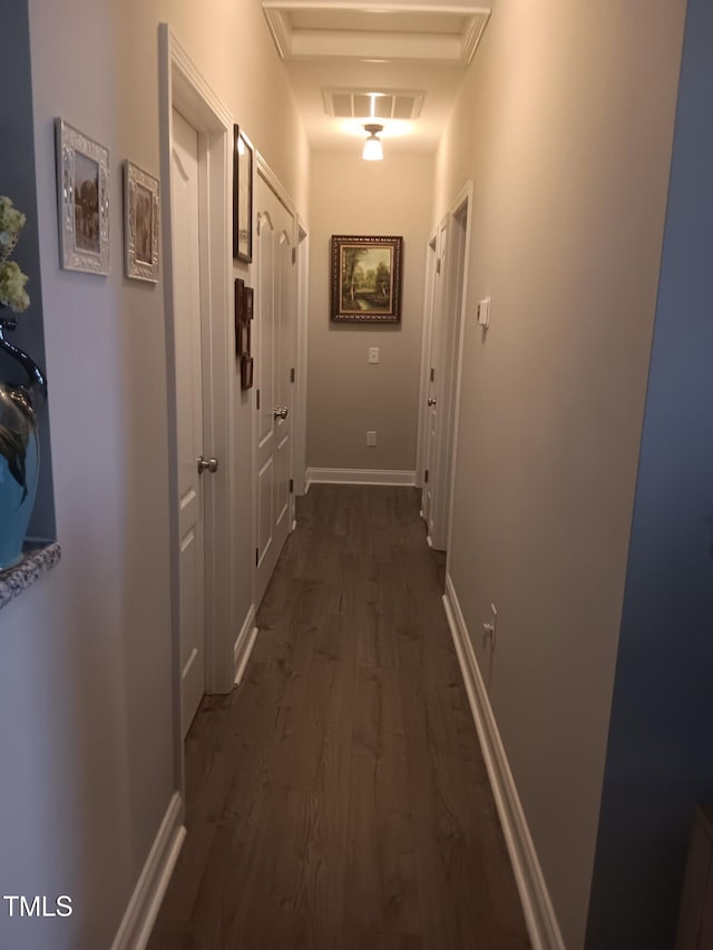 31 Kevior Ave, Four Oaks, NC 27524 - hallway with dark wood-style floors and baseboards